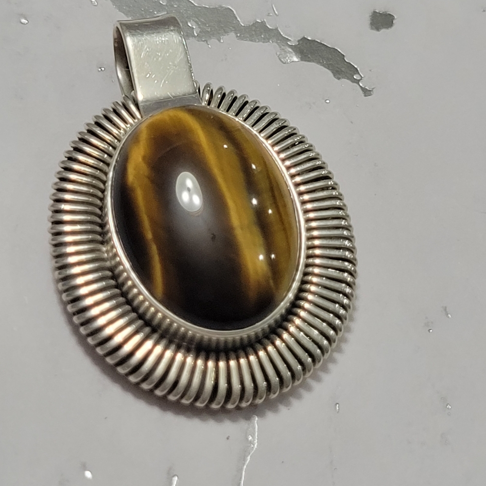 Tigers eye sterling silver pendant